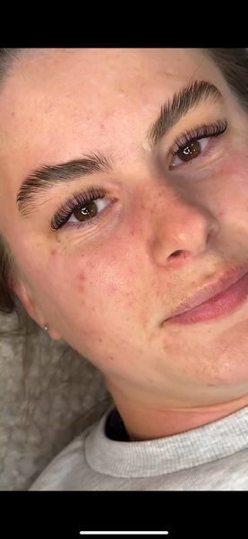 Brows and lashes on a freckled client